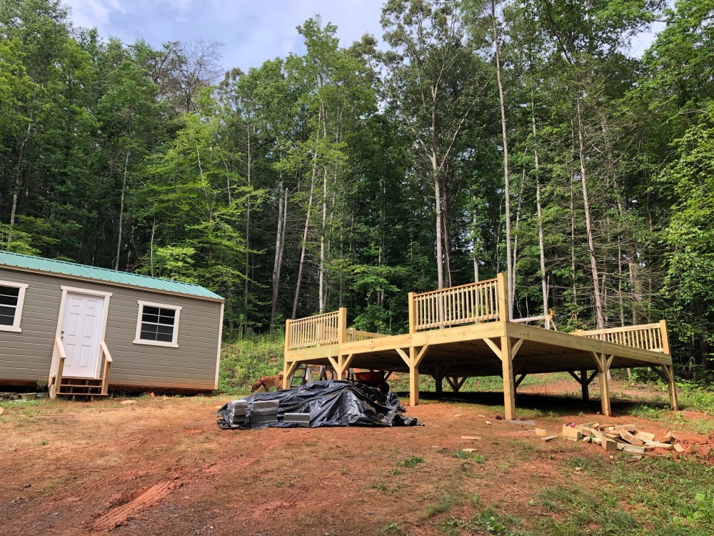 Yurt deck with railing sections installed