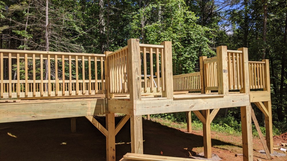 Front landing on wooden yurt deck