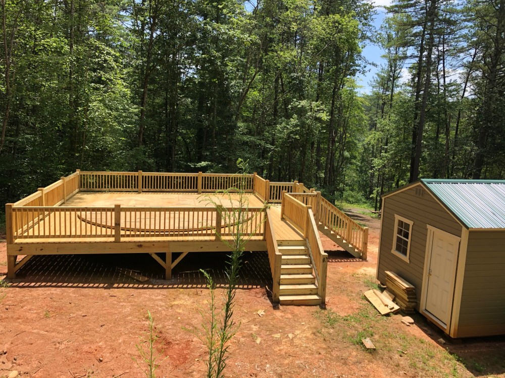 Side view of completed yurt deck with both sets of stairs